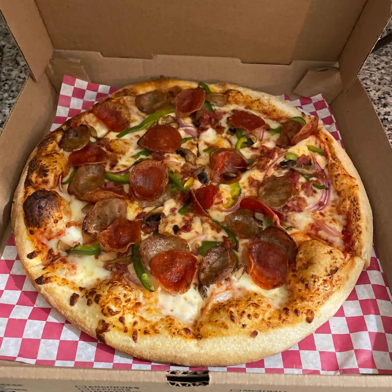 Indulge in Our Supreme Pizza